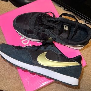 Black /gold Nikes